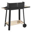 casa.pro Grillwagen Ari Holzkohlegrill BBQ Grillrost aus emailliertem Edelstahl Gartengrill 2 Räder Windschutz mit Grillrosthöhenverstellung 78x86x30cm Schwarz/Holz