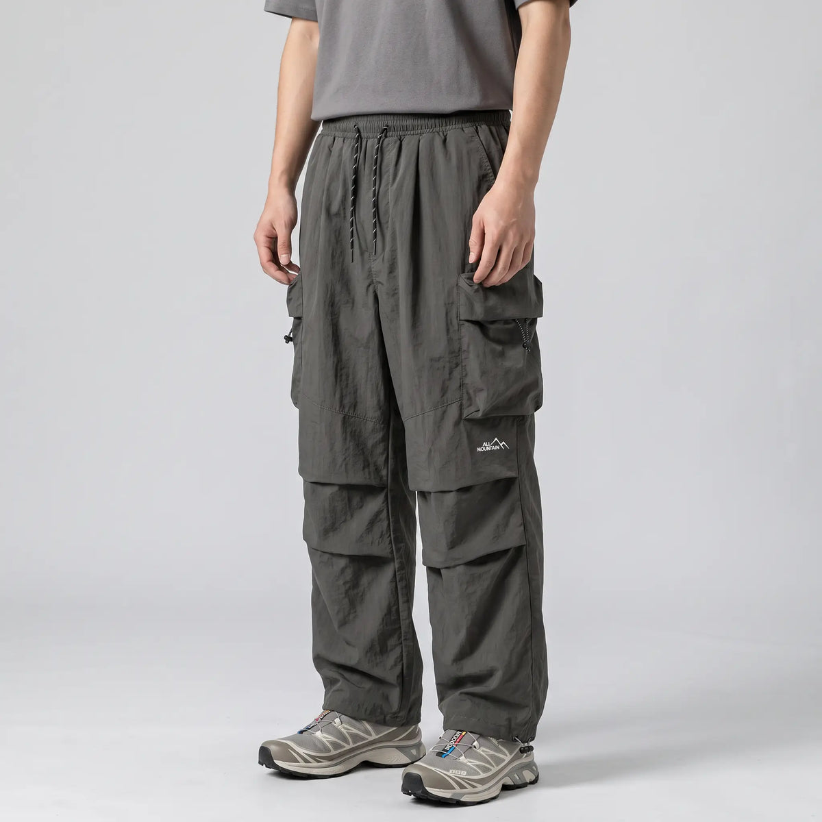 Herren Cargohose – weites Bein, Fallschirm-Stil mit Reißverschlusstaschen