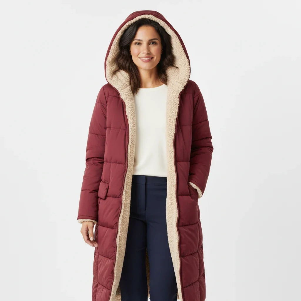 Lange Steppjacke mit Kapuze und Sherpa-Futter für Damen
